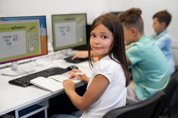 Girl outside on the computer